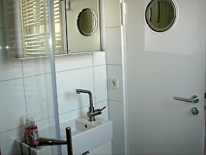 Bathroom with fly screen, high quality magnifying mirror.